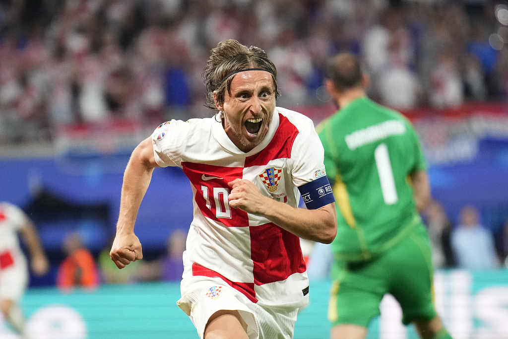 Croatia's Luka Modric celebrates after scoring his side's opening goal during the UEFA Euro 2024 Group B match between Croatia and Italy in Leipzig, Germany, June 24, 2024. /CFP