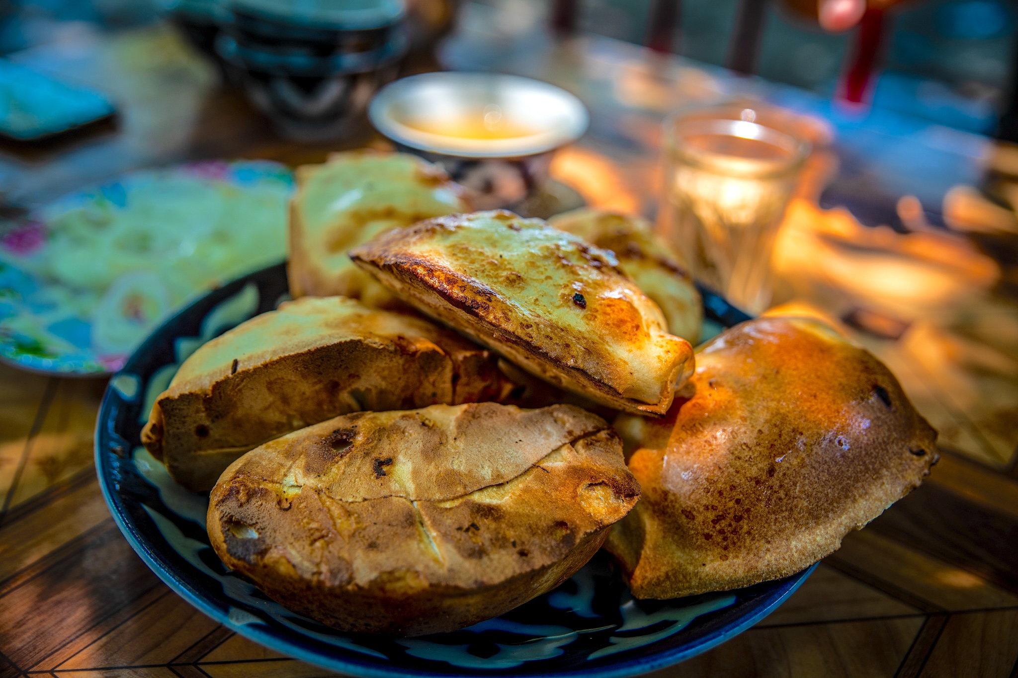 Kyrgyz samsas, a beloved pastry that captivates the taste buds with their delightful blend of flavors and textures. /CFP