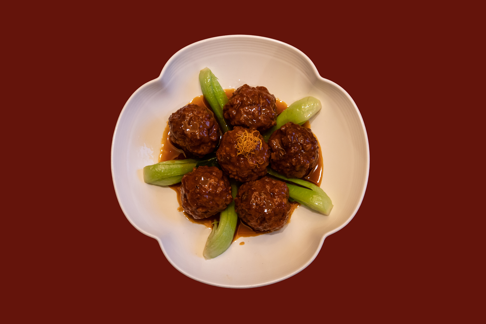 Large meatballs braised in soy sauce, a dish from Kongfu cuisine /CFP