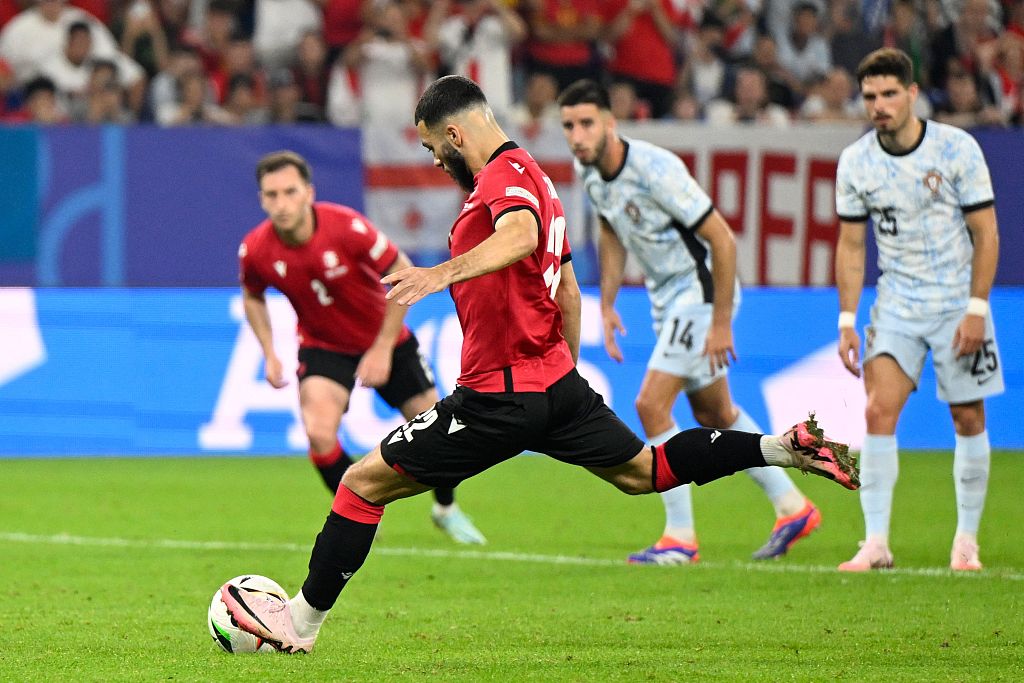 Georges Mikautadze of Georgia kicks and scores a penalty during a UEFA Euro 2024 Group F match between Georgia and Portugal, in Gelsenkirchen, Germany, June 26, 2024. /CFP