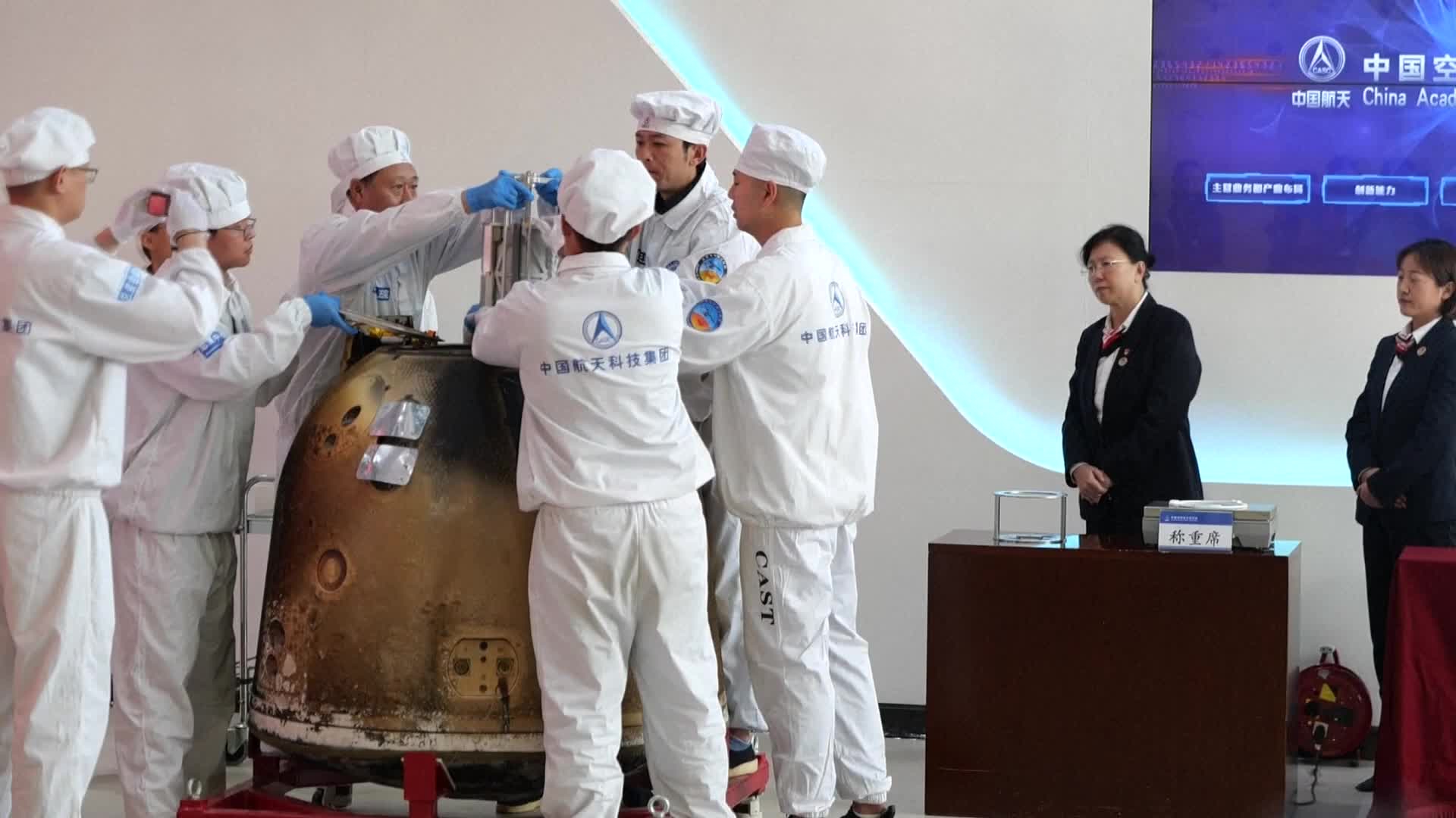 The returner of China's Chang'e-6 lunar probe was opened at a ceremony in Beijing on June 26, 2024. /IC