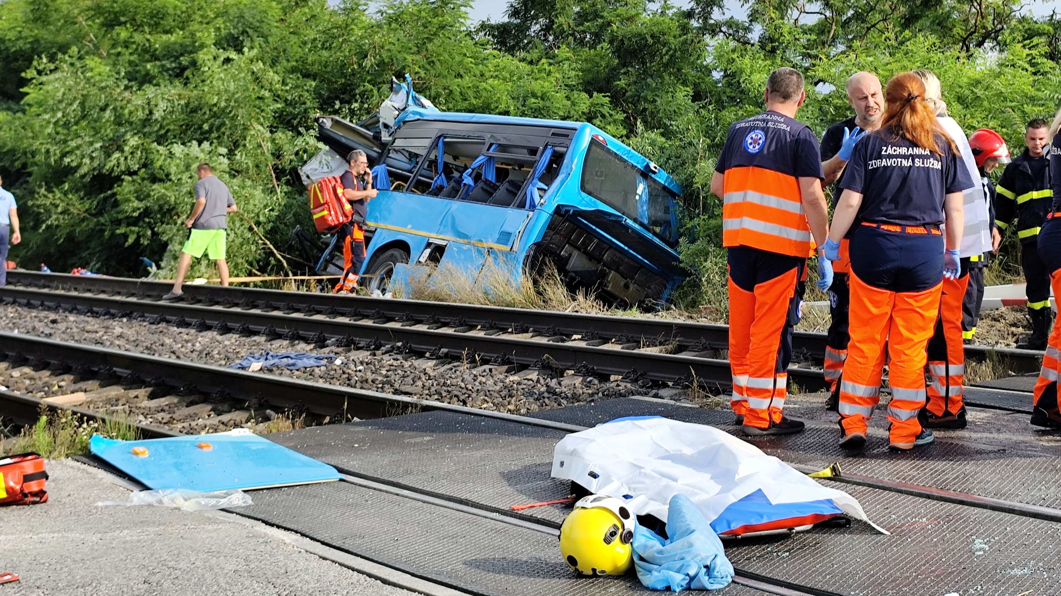 Emergency personnel work at the site of a train crash with a bus near Nove Zamky, Slovakia, June 27, 2024. /Reuters
