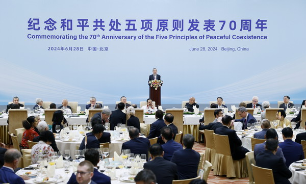 Wang Yi addresses the luncheon marking the 70th anniversary of the Five Principles of Peaceful Coexistence in Beijing, China, June 28, 2024. /Chinese Foreign Ministry