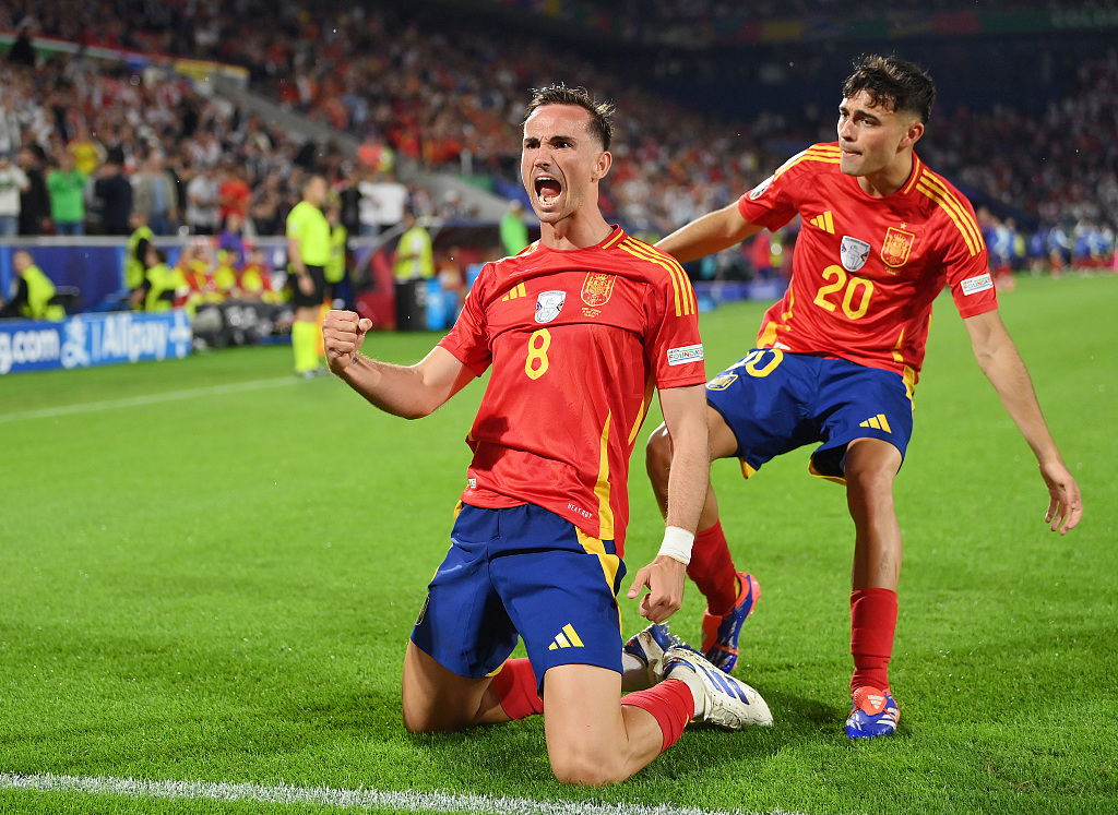 Fabian Ruiz (front) of Spain celebrates scoring his team's second goal during a UEFA Euro 2024 round of 16 match between Spain and Georgia at Cologne Stadium in Cologne, Germany, June 30, 2024. /CFP