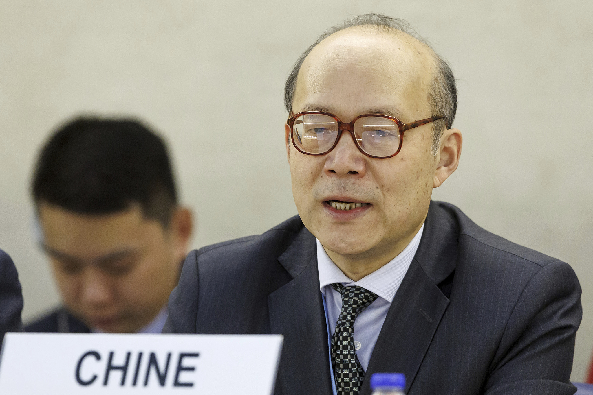 Chen Xu, permanent representative of China to the UN office in Geneva and other international organizations in Switzerland, speaks at the UN Human Rights Council's Universal Periodic Review (UPR) Working Group meeting at the European UN Headquarters in Geneva, Switzerland, January 23, 2024. /CFP