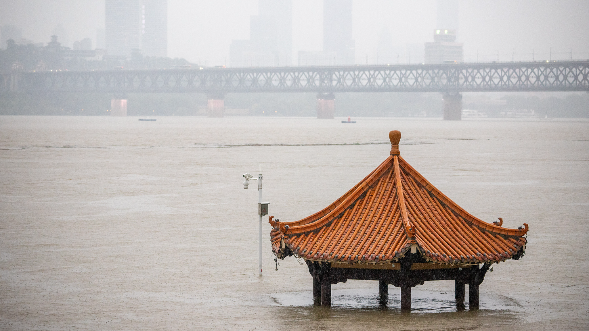 Wuhan City of central China's Hubei Province experienced continuous rainy weather, and the water level of the Yangtze River kept rising on July 1, 2024. /CFP
