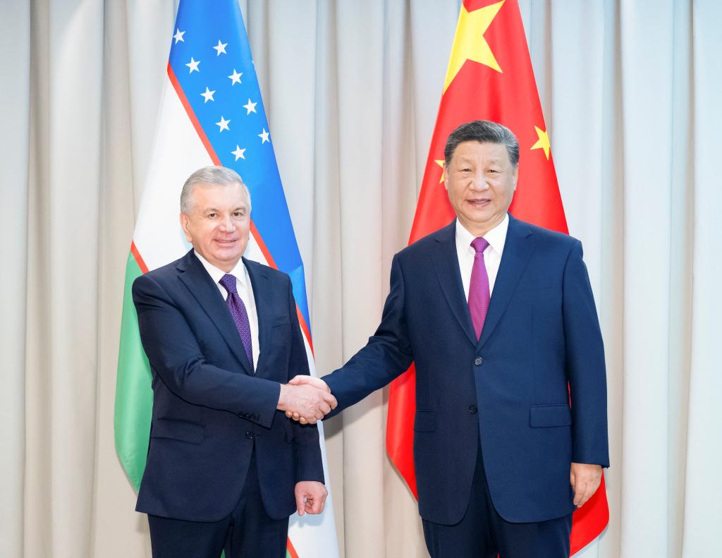 Chinese President Xi Jinping meets with Uzbek President Shavkat Mirziyoyev ahead of the 24th Meeting of the Council of Heads of State of the Shanghai Cooperation Organization in Astana, Kazakhstan, July 3, 2024. /Xinhua