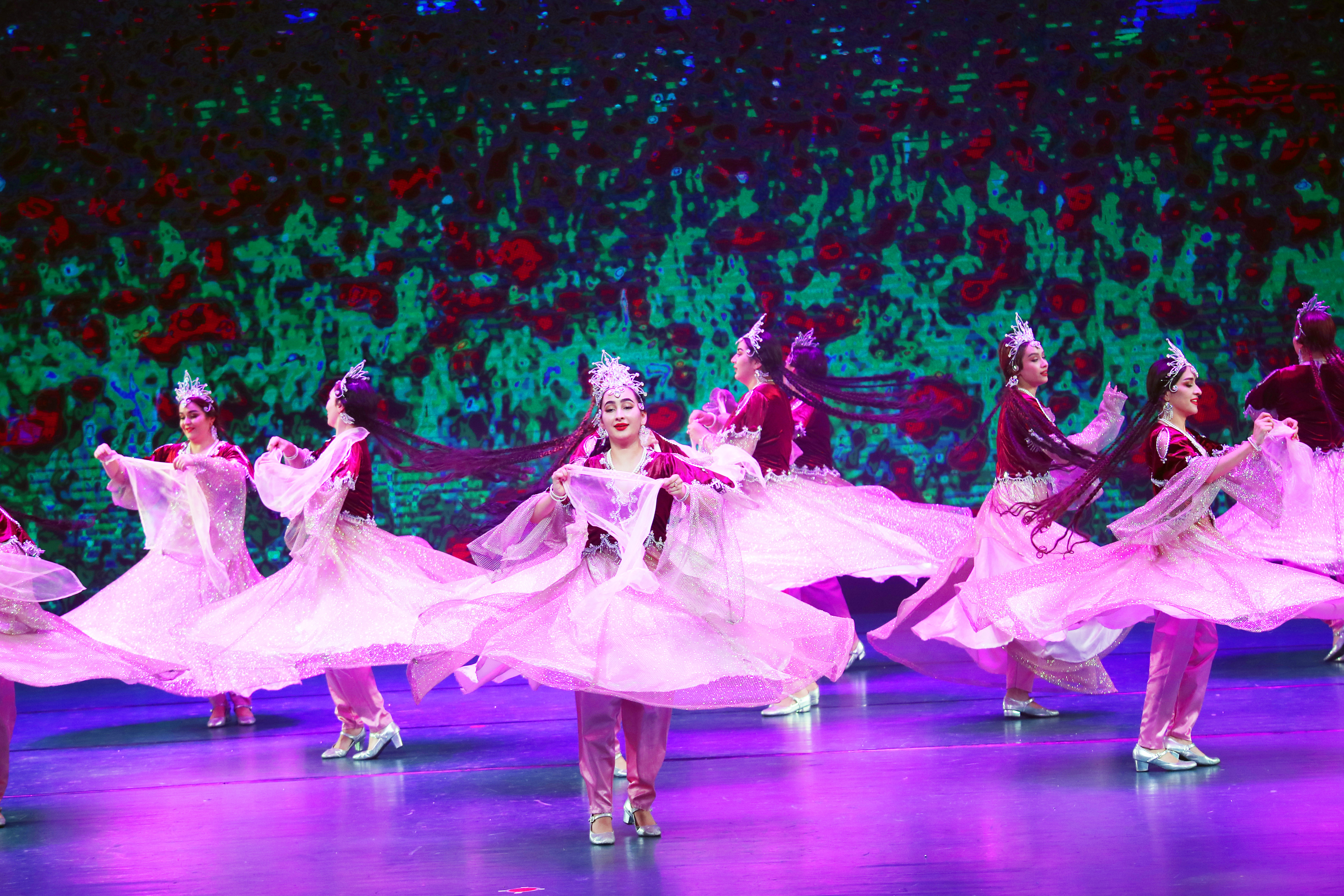 Tajik dancers perform at a theater in Urumqi, Xinjiang Uygur Autonomous Region on July 28, 2023. /IC