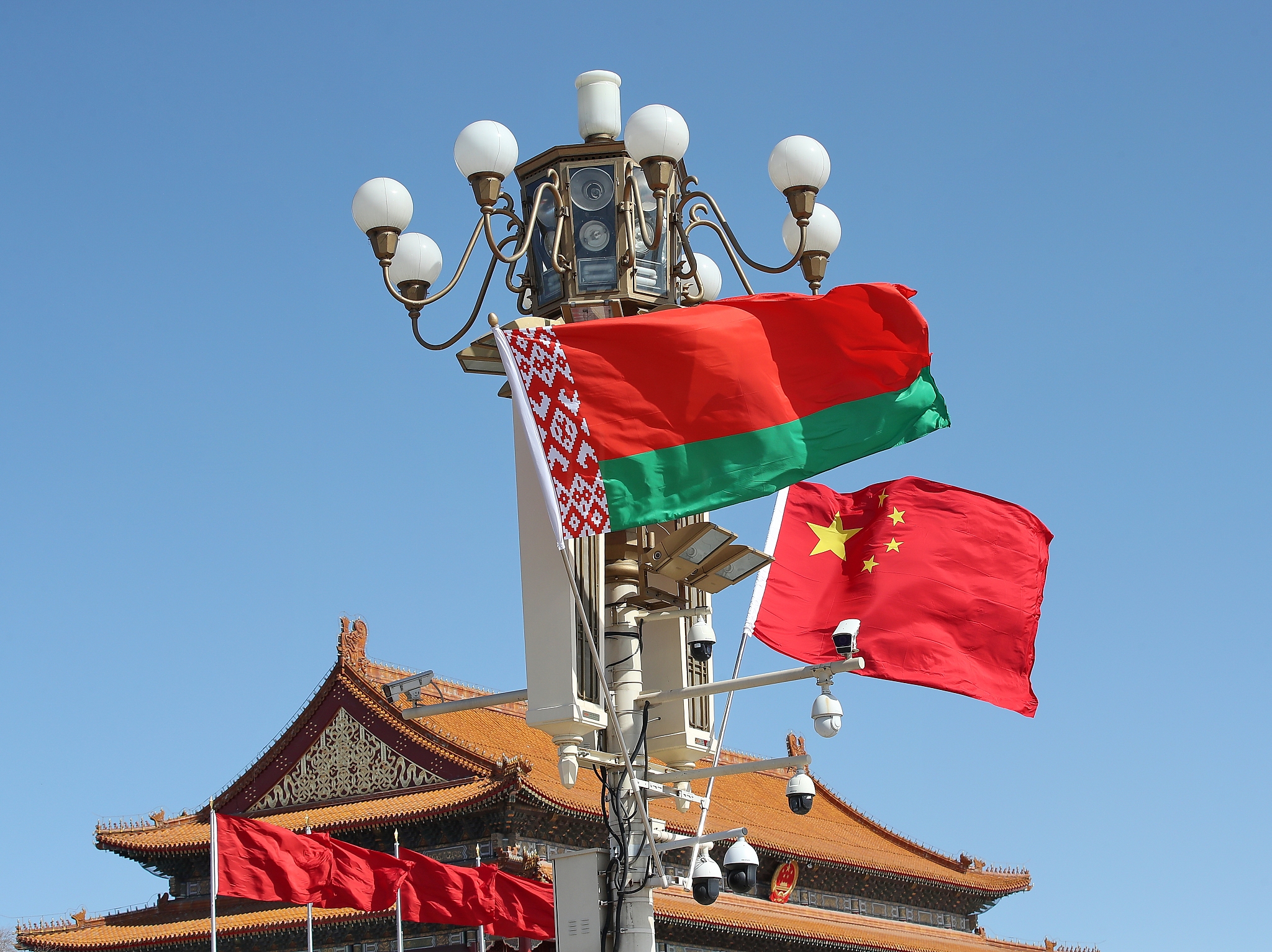 The national flags of China and Belarus at Tiananmen Square welcome Belarusian President Alexander Lukashenko on his state visit to China, Beijing, capital of China, March 1, 2023. /CFP