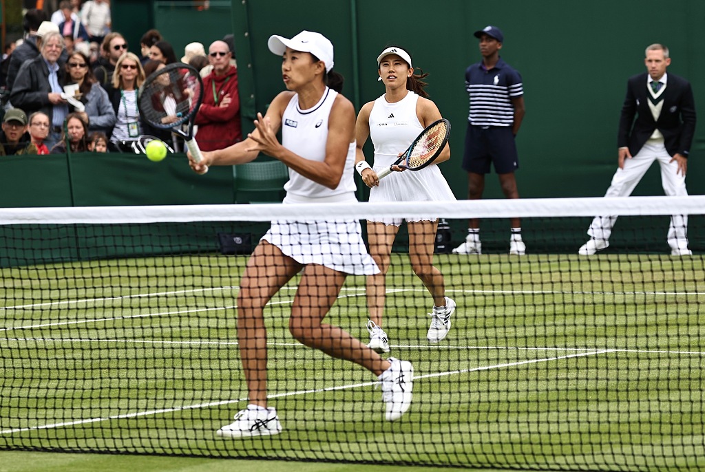 Zhang Shuai (front) of China and Miyu Kato of Japan in action during a women's doubles match at the Wimbledon Tennis Championships in London, England, July 3, 2024. /CFP