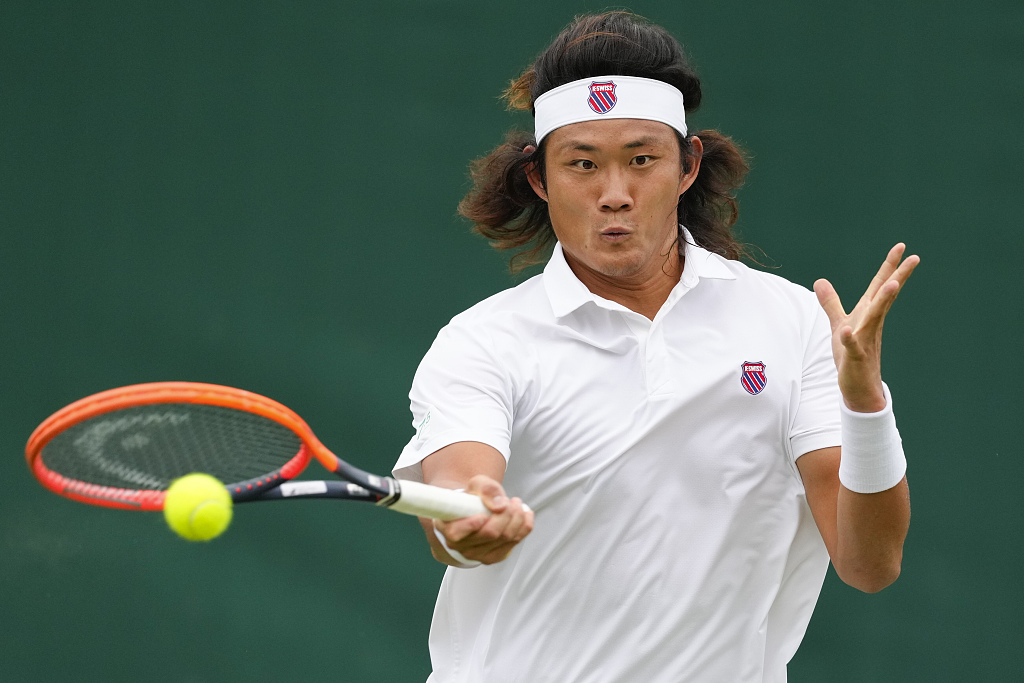 Zhang Zhizhen of China in action during a men's singles match at the Wimbledon Tennis Championships in London, England, July 3, 2024. /CFP 