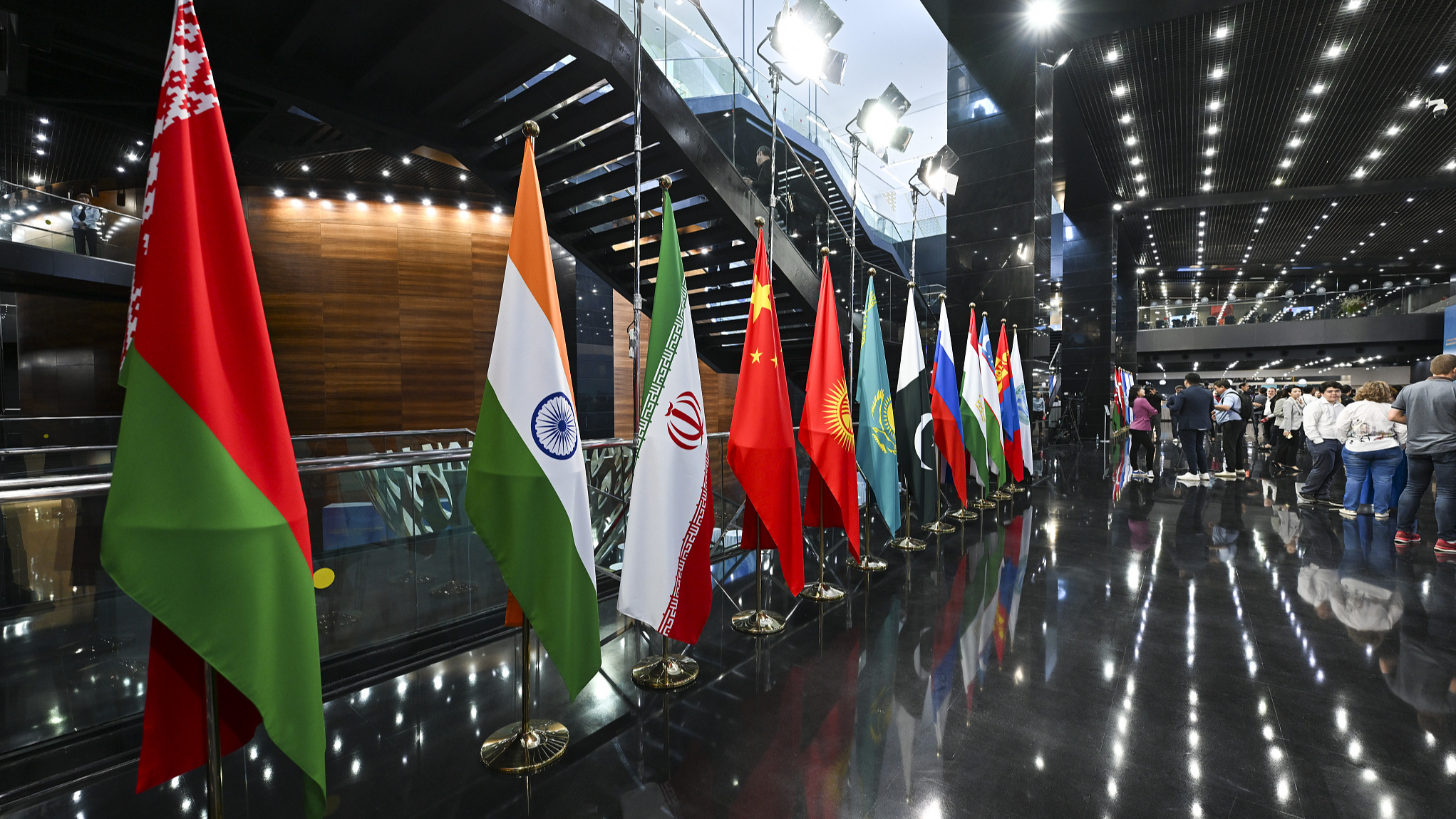 The flags of the countries participating in the summit are displayed inside the Palace of Peace and Reconciliation building, where the summit is held in Astana, Kazakhstan, July 4, 2024. /CFP 
