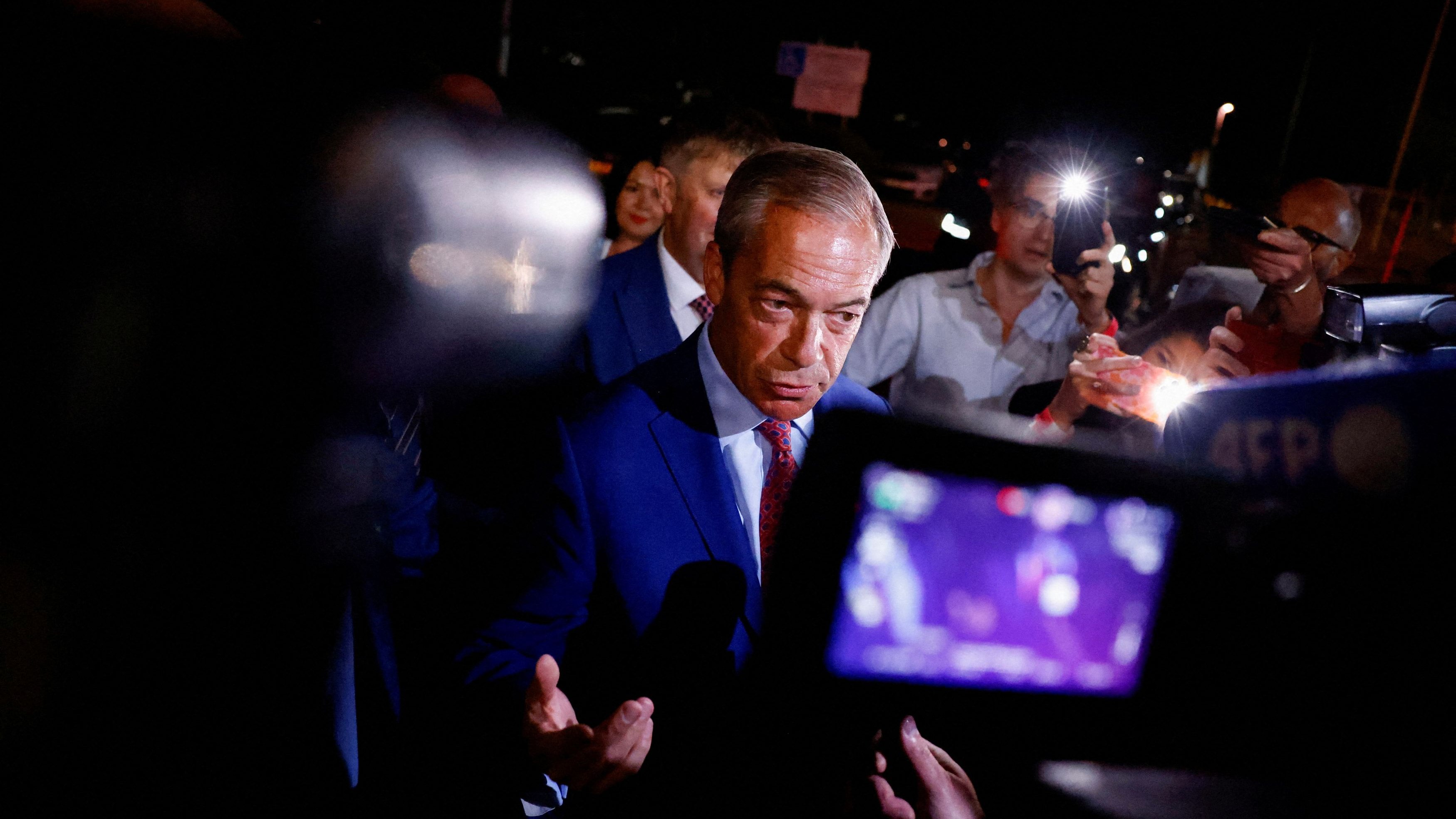 Britain's Reform UK Party leader Nigel Farage reacts while speaking to the media as the counting of votes continues during the UK election in Clacton-on-Sea, Britain, July 5, 2024. /Reuters