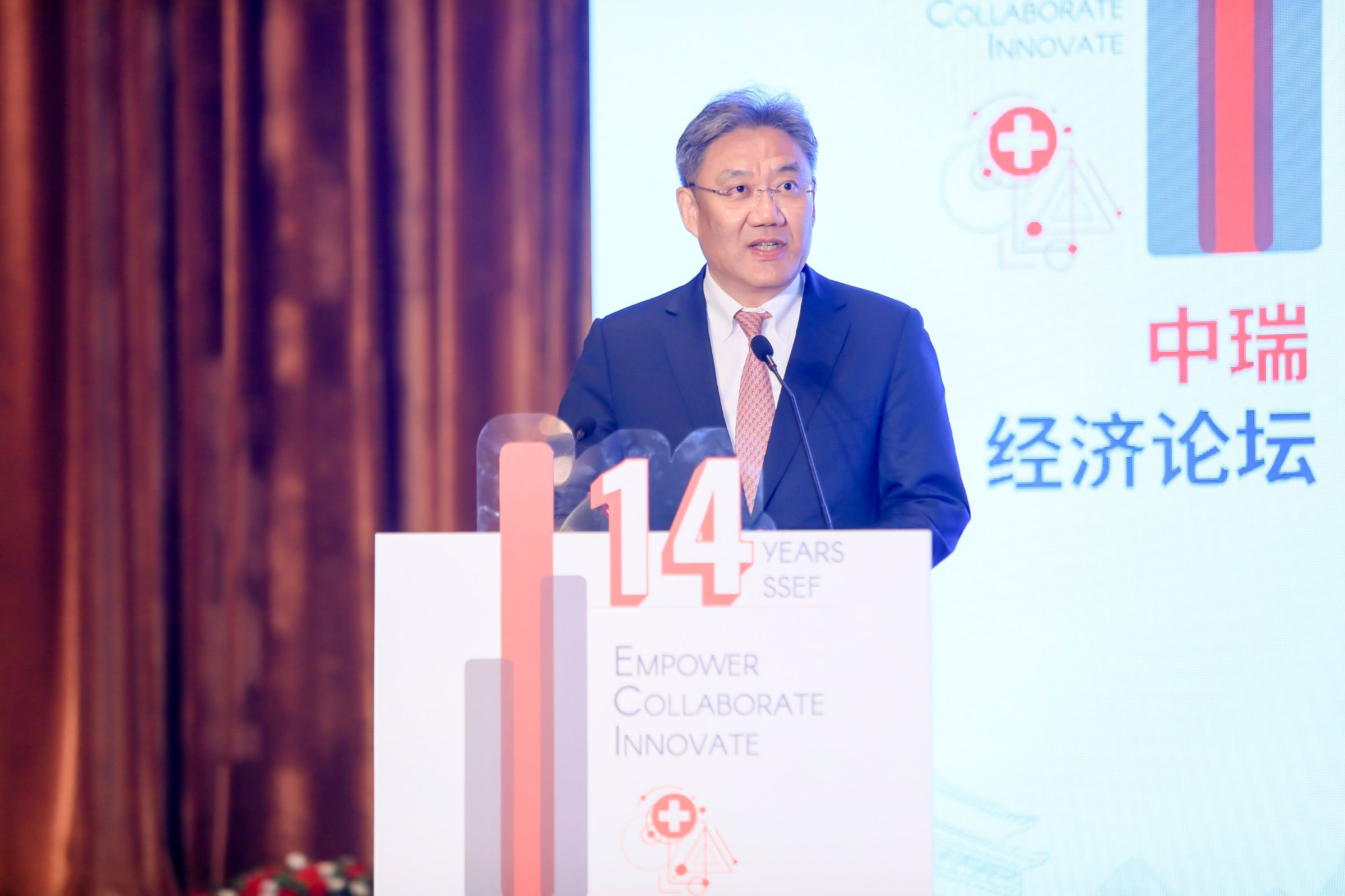 Chinese Commerce Minister Wang Wentao speaking at the eighth Sino-Swiss Economic Forum in China World Summit Wing, Beijing, China, July 1, 2024. /China Swiss Chamber of Commerce & Embassy of Switzerland in China. 