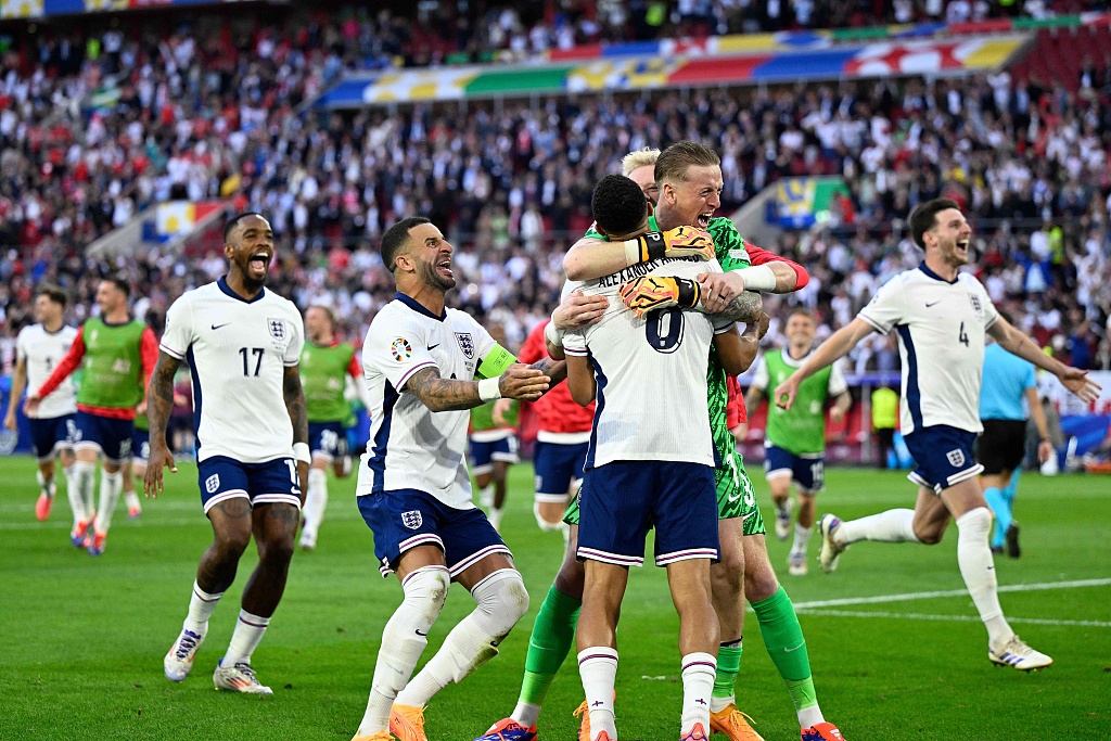 England players celebrate after defeating Switzerland 5-3 in a penalty shootout in the Euro 2024 quarterfinals in Düsseldorf, Germany, July 6, 2024. /CFP