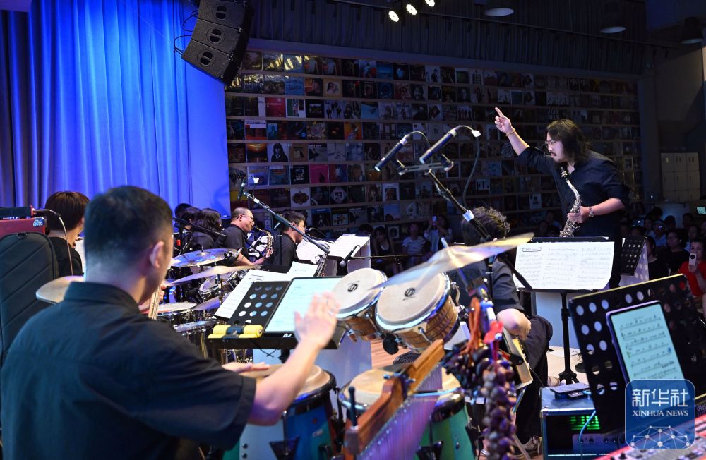 The Li Gaoyang DeFactto Jazz Orchestra performs in the 798 Art District of Beijing on July 6, 2024. /Xinhua