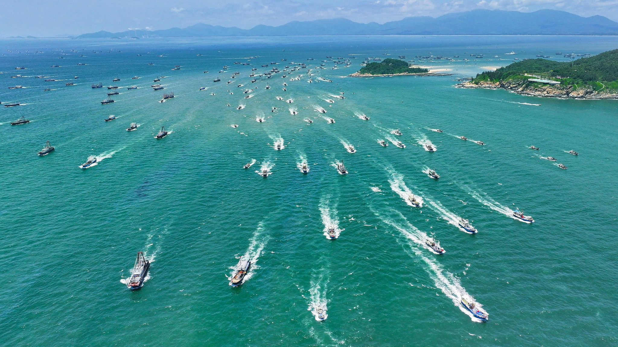 Over 900 fishing vessels from the Zhapo National Central Fishing Port filed out in Yangjiang, Guangdong Province, on Aug 16, 2023. /CFP