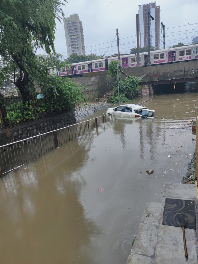 A car stuck in waterlogging under the Sainath Subway, Malad, Mumbai, July 8, 2024. /Post by Mumbai Traffic Police on social media platform X