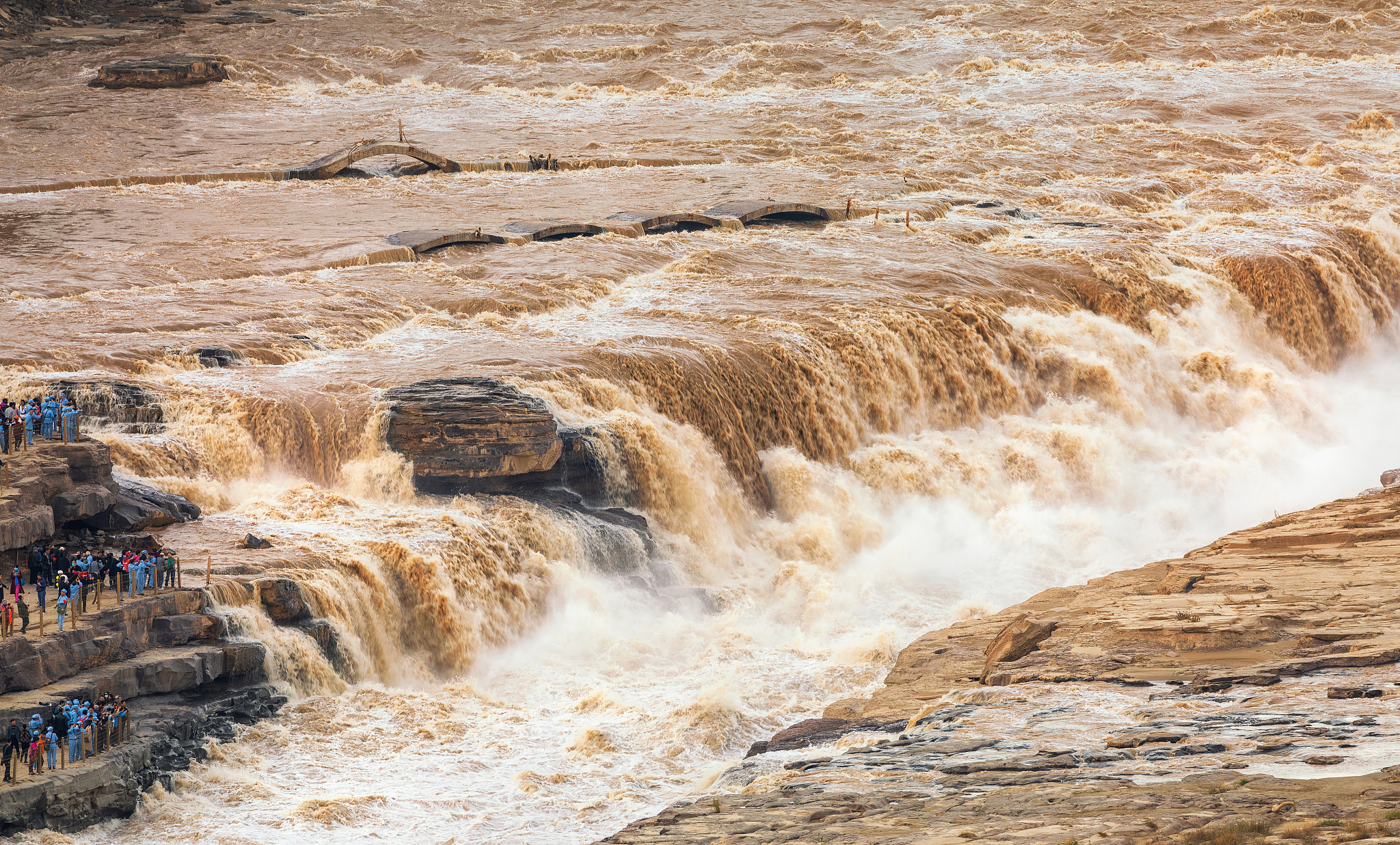 A view of the Hukou Waterfall on the Yellow River. It sits at the intersection of northern China's Shanxi and Shaanxi provinces. The Yellow River Protection Law was approved in 2022 and became effective on April 1, 2023. /CFP