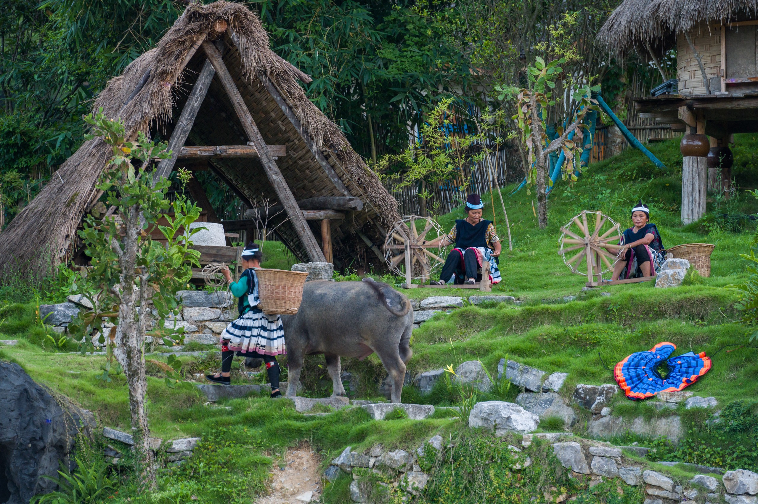 Yao women who demonstrate traditional farming methods in the live performance 