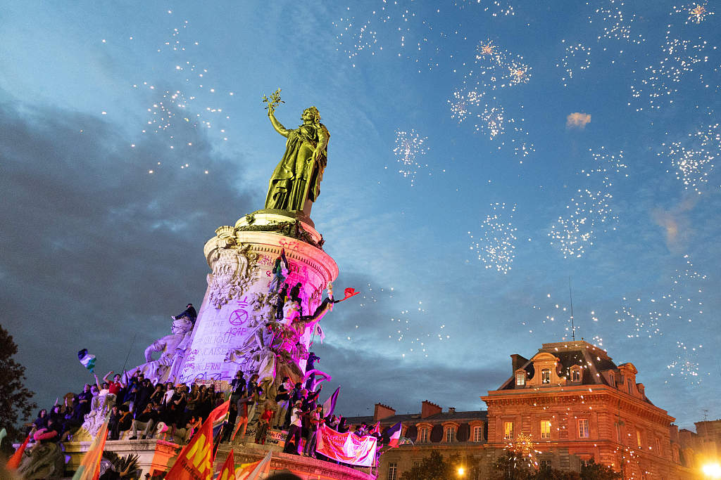 Fireworks sparkle over the Statue of the Republic as people gather for an election night event following the second round of France legislative election at Republique Square in Paris, France, July 7, 2024. /CFP