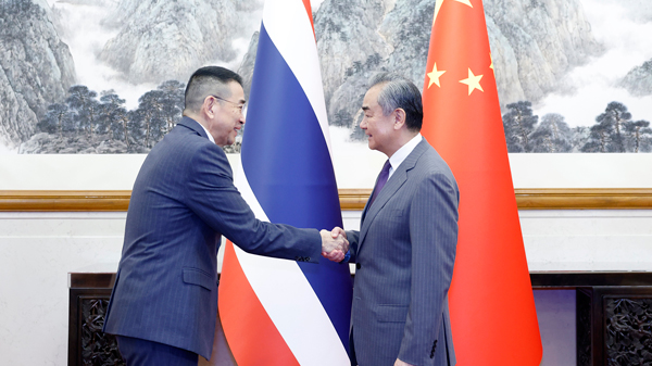 Chinese Foreign Minister Wang Yi (R), also a member of the Political Bureau of the CPC Central Committee, meets with Thai Minister of Foreign Affairs Maris Sangiampongsa, in Beijing, China, July 9, 2024. /Chinese Foreign Ministry