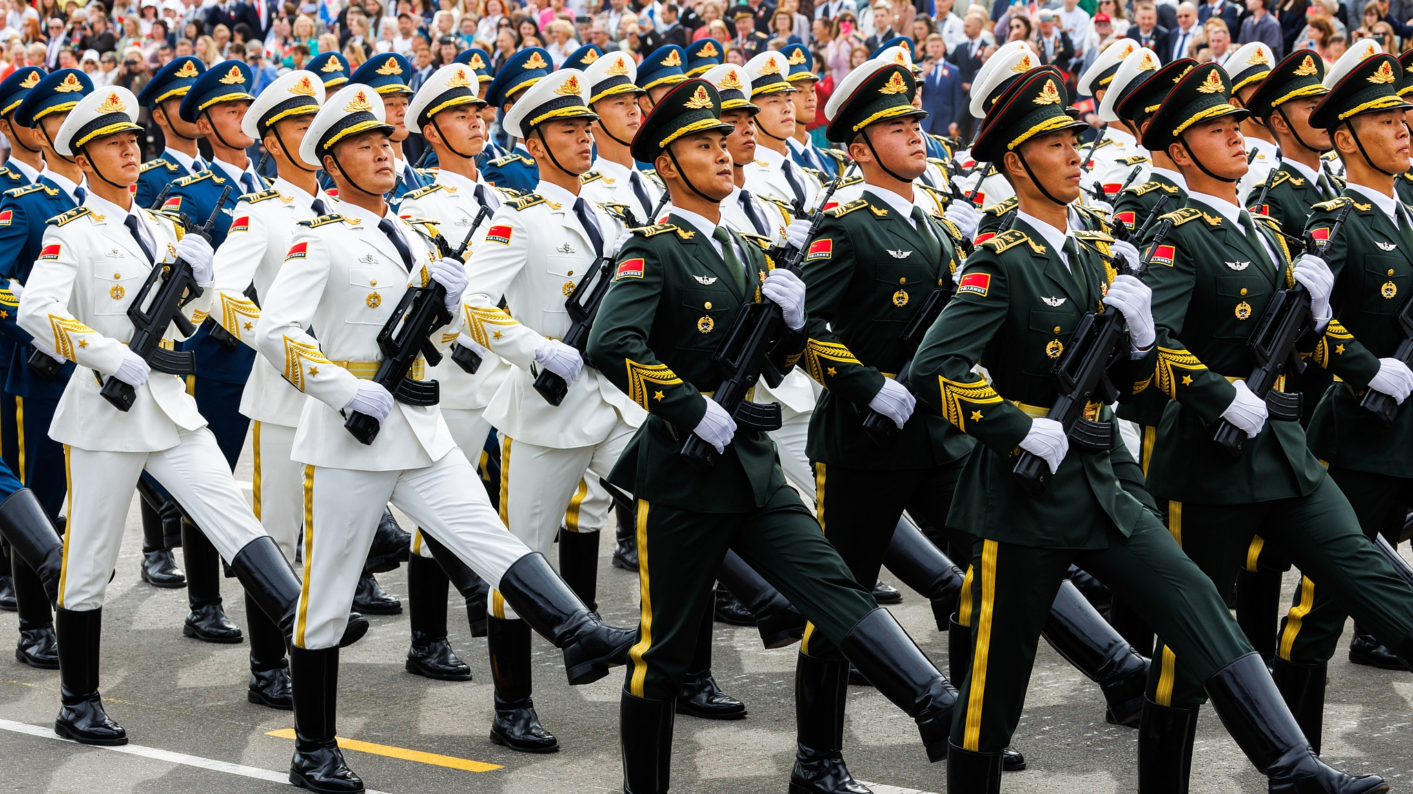 A file photo of China's PLA marching in formation at a military parade. /CFP