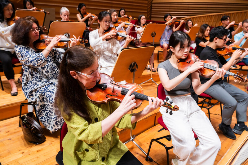 SOA students join NY Phil musicians for a side-by-side rehearsal in Shanghai on July 3, 2024. /Chris Lee