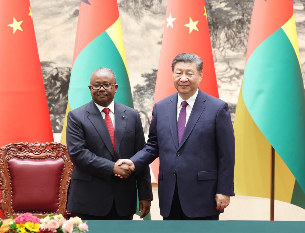 Chinese President Xi Jinping shakes hands with President Umaro Sissoco Embalo of the Republic of Guinea-Bissau in Beijing, capital of China, July 10, 2024. /Xinhua
