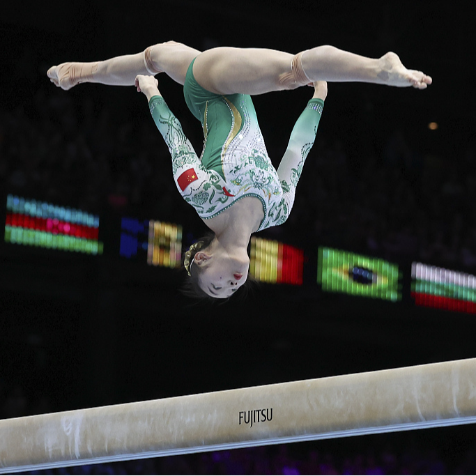 Quick rise of artistic gymnast Zhou Yaqin comes from solid work CGTN
