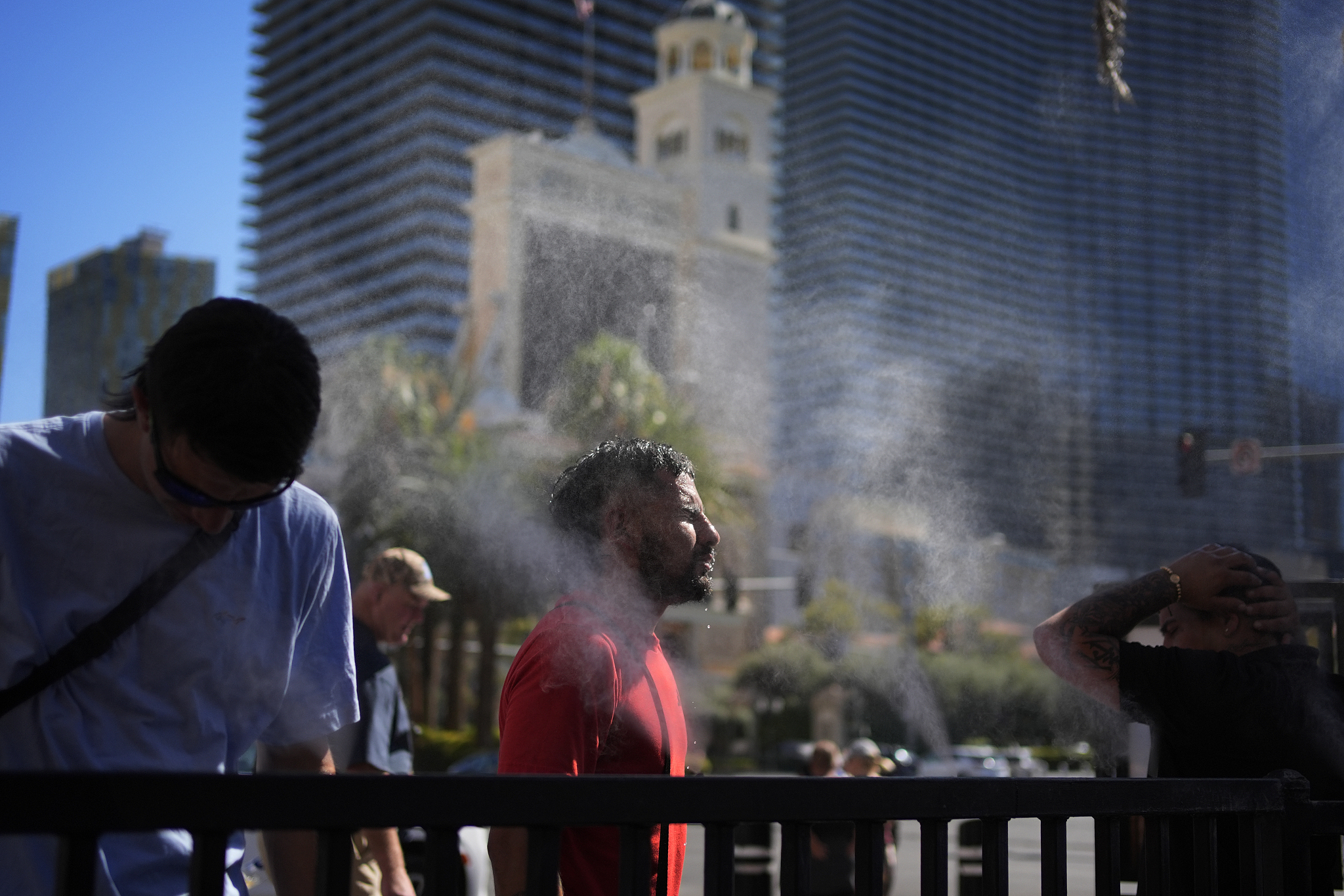 People cool off in misters along the Las Vegas Strip, July 7, 2024, in Las Vegas, Nevada, U.S. /CFP 