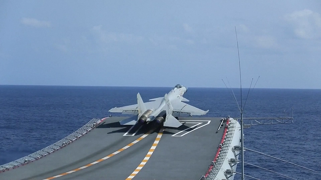 A file photo of a fighter jet taking off from the Chinese aircraft carrier Shandong at an undisclosed location. /CFP
