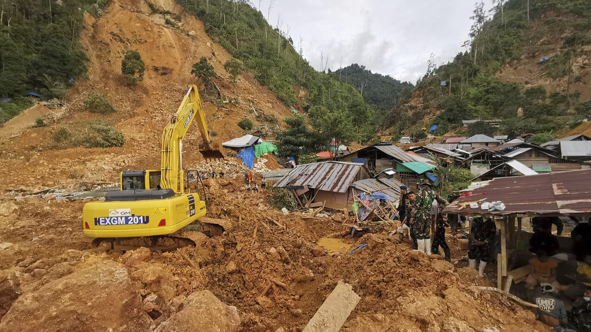 A joint rescue team conducts a search and rescue operation for missing people at a traditional gold mine in Tulabo village, Samawa, Gorontalo province, Indonesia, July 10, 2024. /CFP