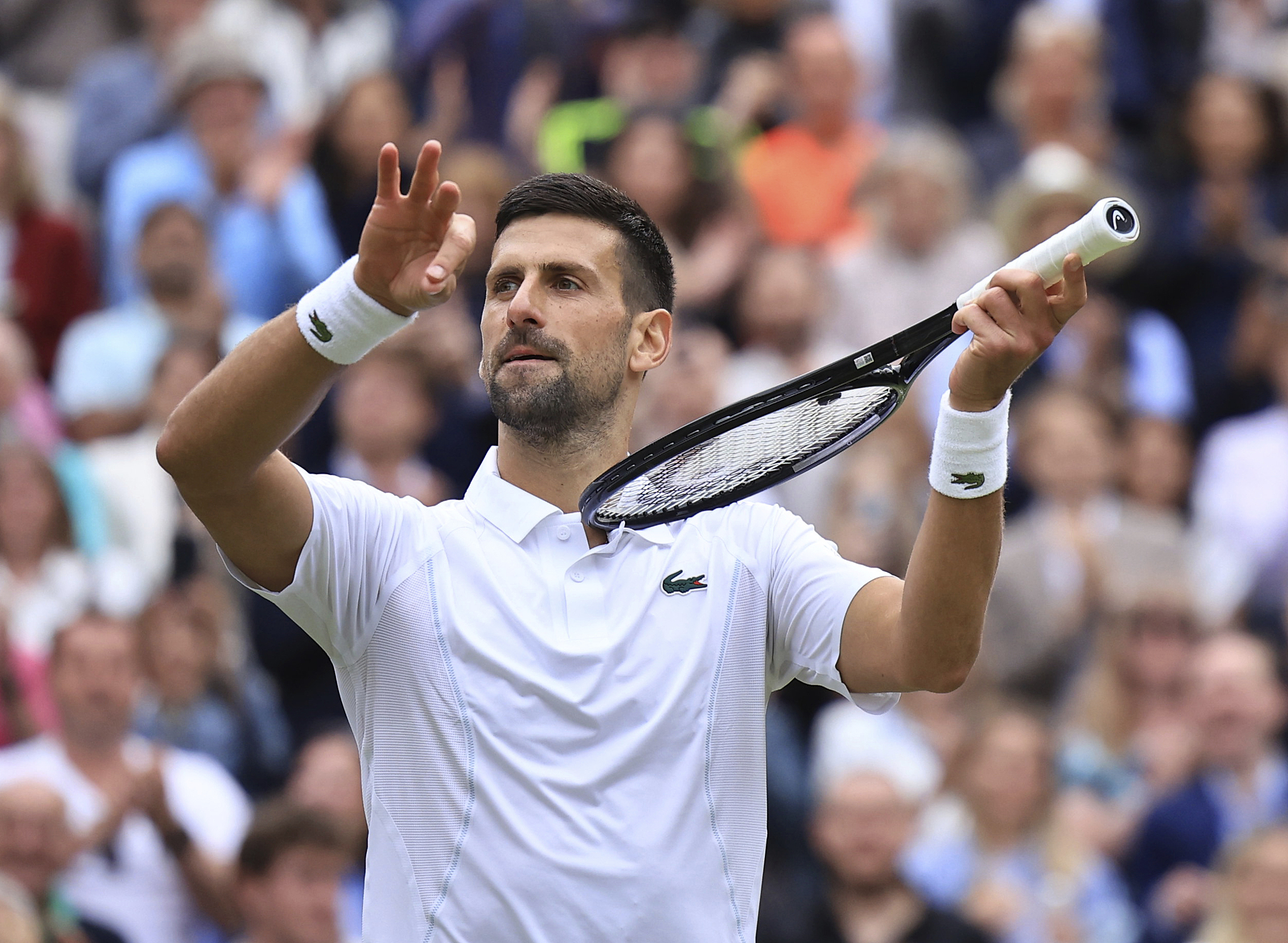 Novak Djokovic of Serbia celebrates after defeating Lorenzo Musetti of Italy in the men's semifinals match at the Wimbledon Championships at the All England Lawn Tennis and Croquet Club in London, United Kingdom, July 12, 2024. /CFP