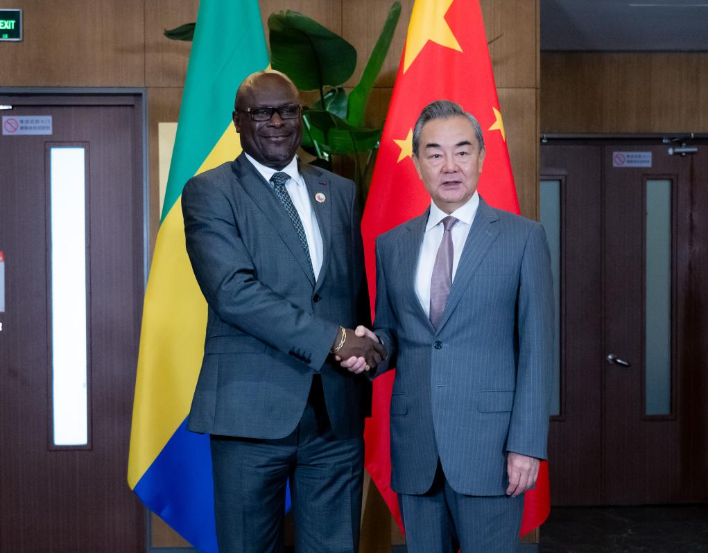 Chinese Foreign Minister Wang Yi meets with Gabonese Minister of Foreign Affairs Regis Onanga Ndiaye, who is in China for the Second High-Level Conference of the Forum on Global Action for Shared Development, in Beijing, capital of China, July 12, 2024. /Xinhua