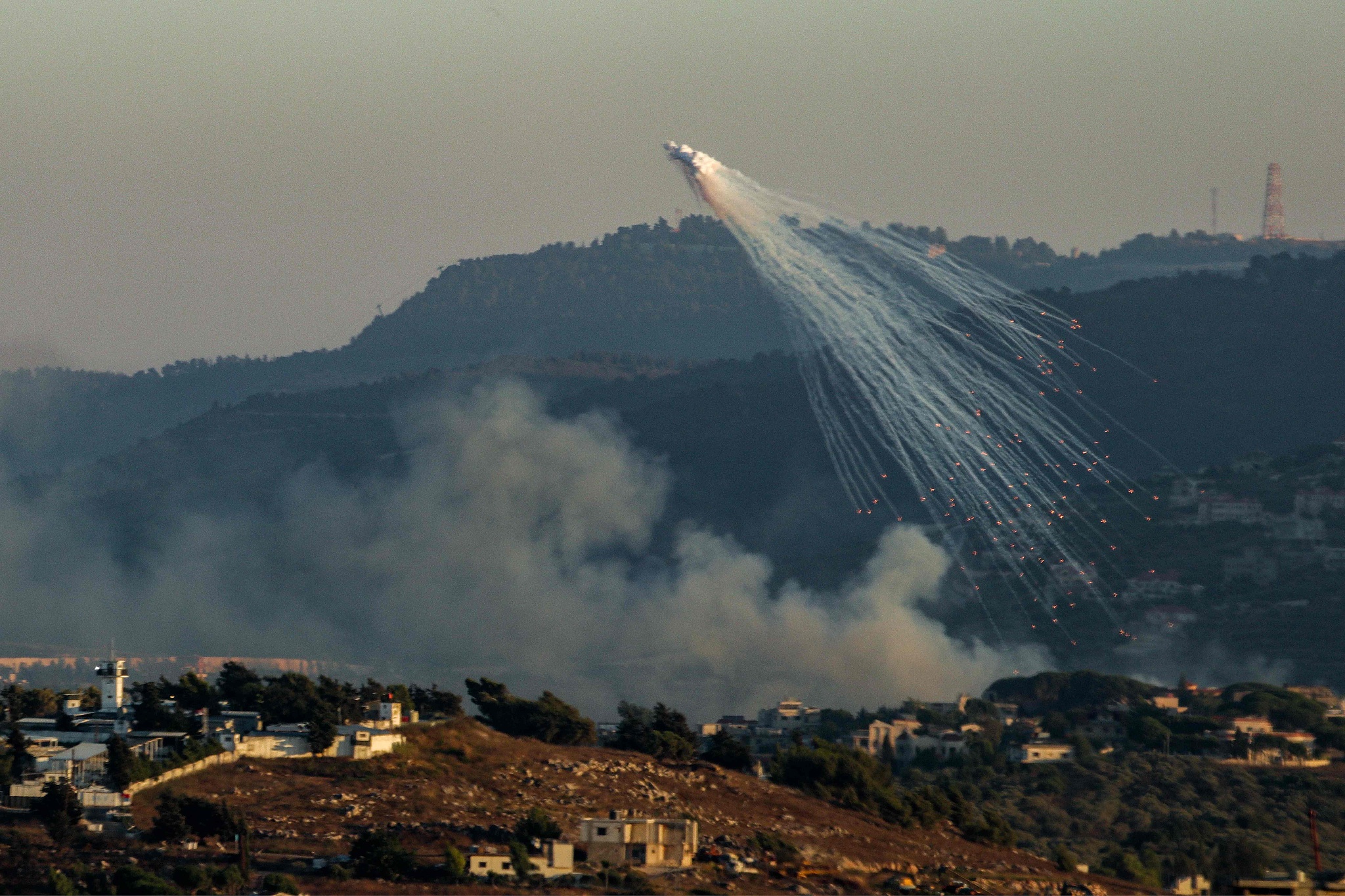 Smoke from Israeli bombardment billows in Kfarkila in southern Lebanon amid ongoing cross-border tensions as fighting continues, July 12, 2024. /CFP