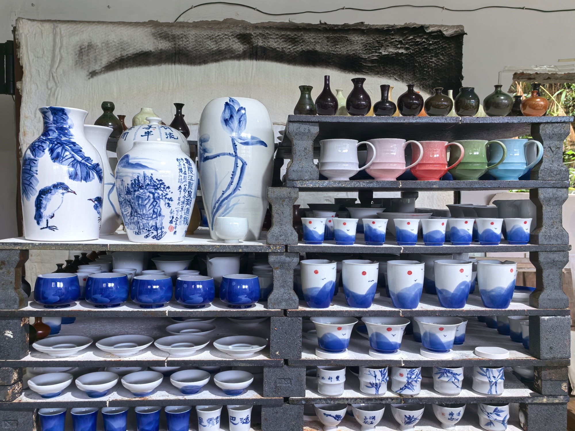 Porcelain products are displayed at Jinquan Porcelain Cultural Center in Sanhe Village, Chongqing, on July 10, 2024. /CGTN