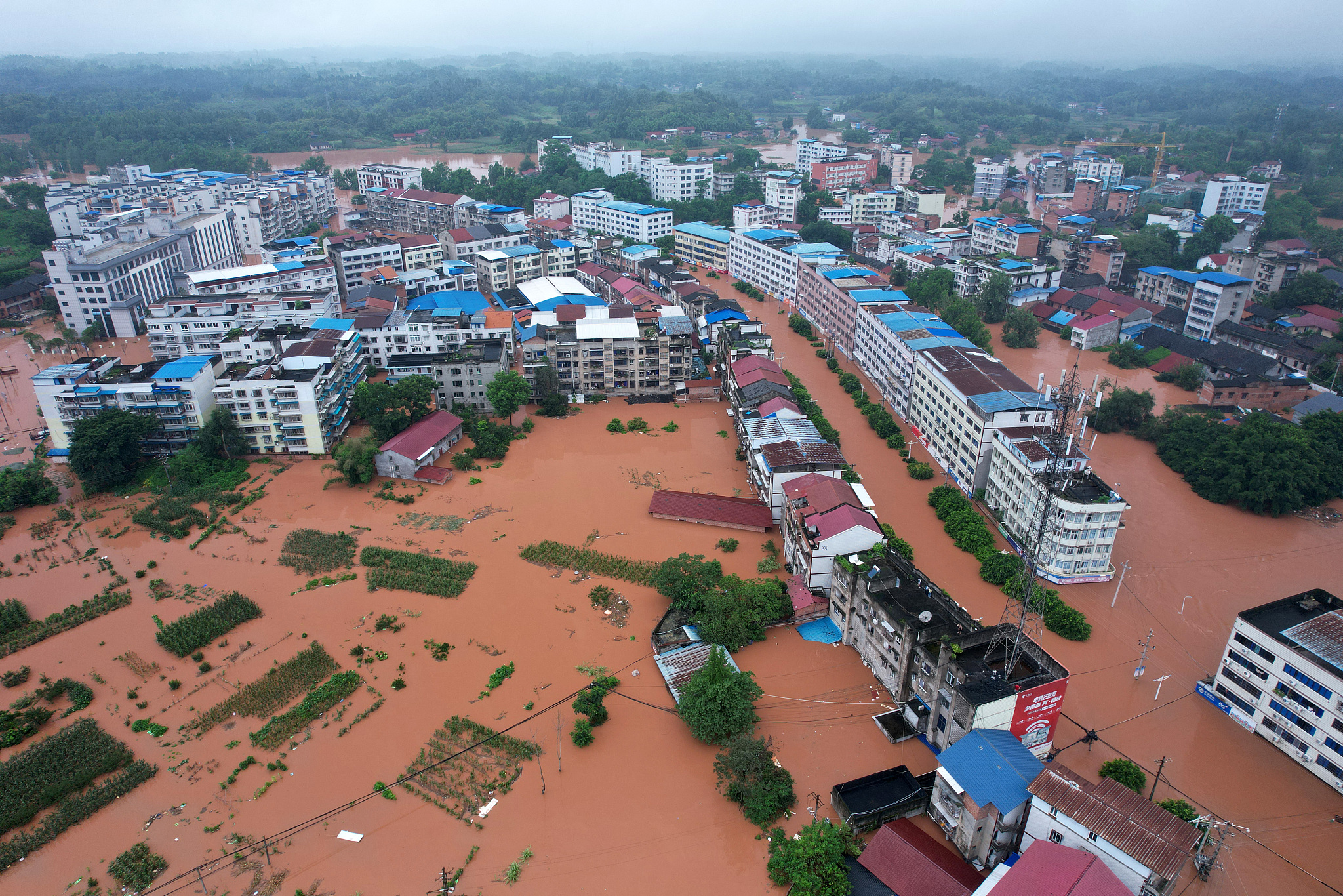 A town is besieged by floods in Neijiang City, southwest China's Sichuan Province, July 14, 2024. /CFP