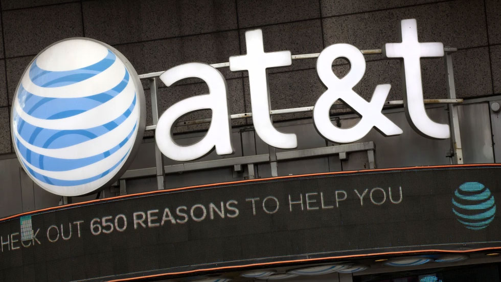 The AT&T logo is positioned above one of its retail stores in New York, U.S. October 24, 2016. /AP