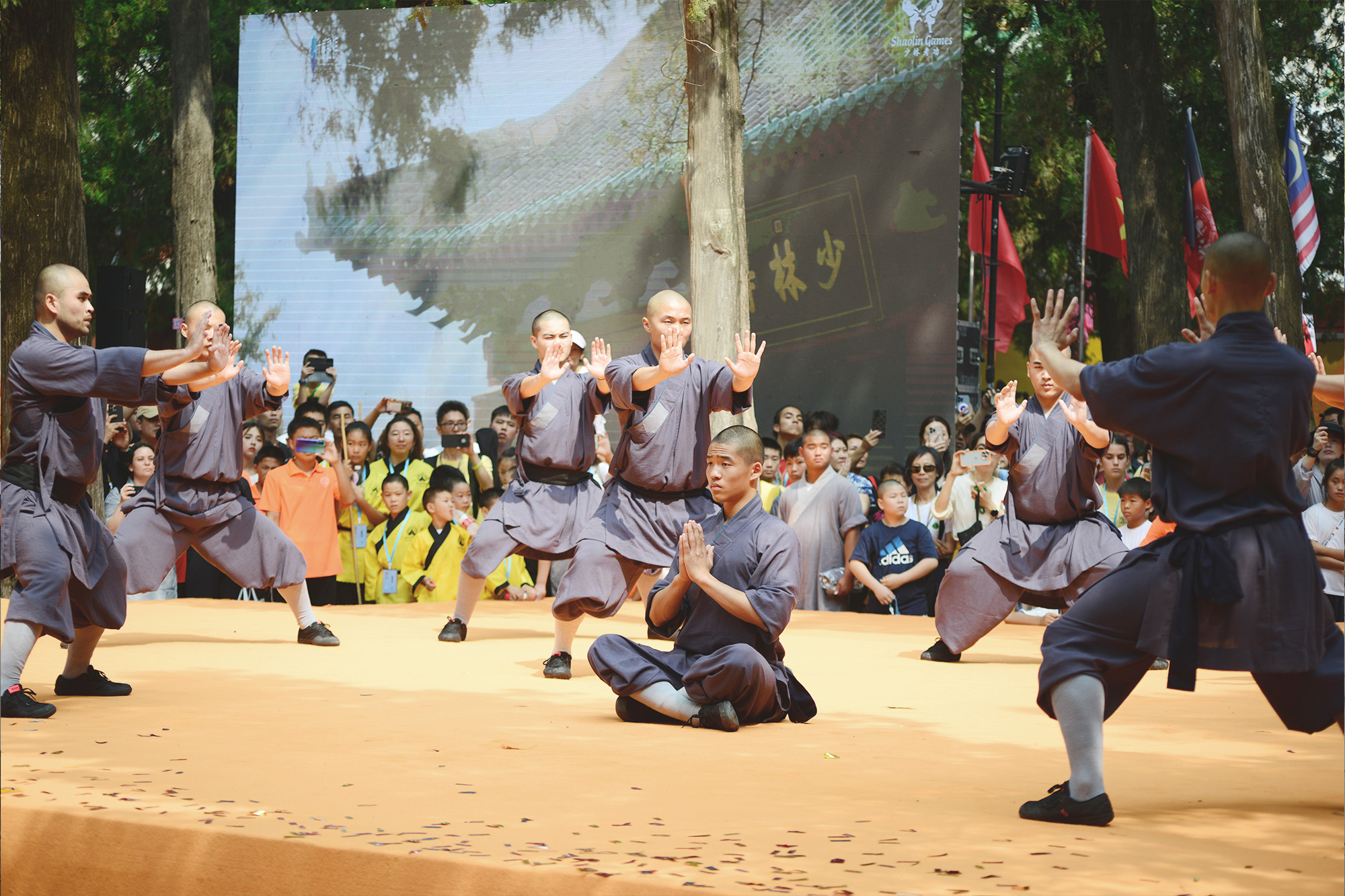 Chinese Shaolin disciples perform at the opening ceremony of the 2024 Shaolin Games Finals, July 13, 2024. /CGTN