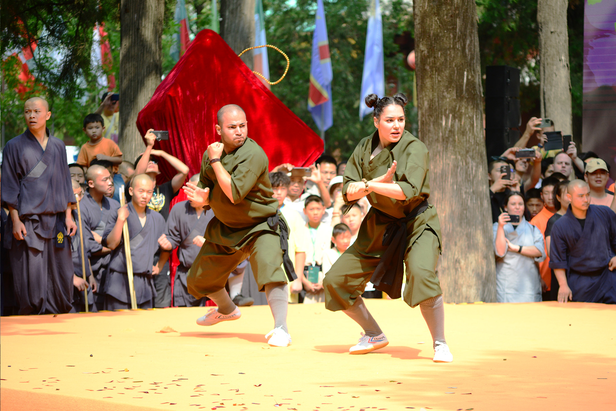 Overseas Shaolin disciples perform at the opening ceremony of the 2024 Shaolin Games Finals, July 13, 2024. /CGTN