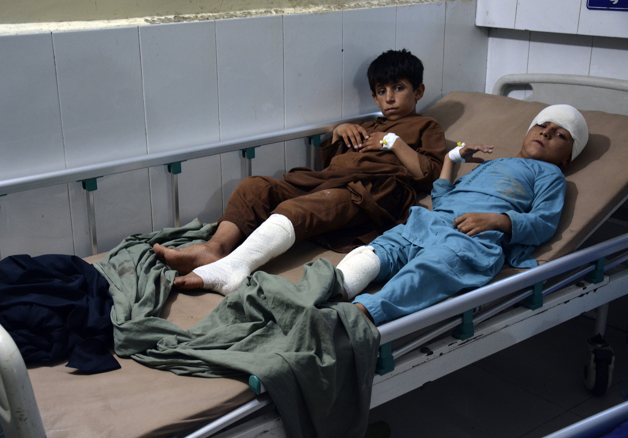 Injured victims of a rainstorm are treated at a hospital, Jalalabad, Nangarhar province, Afghanistan, July 15, 2024. /CFP