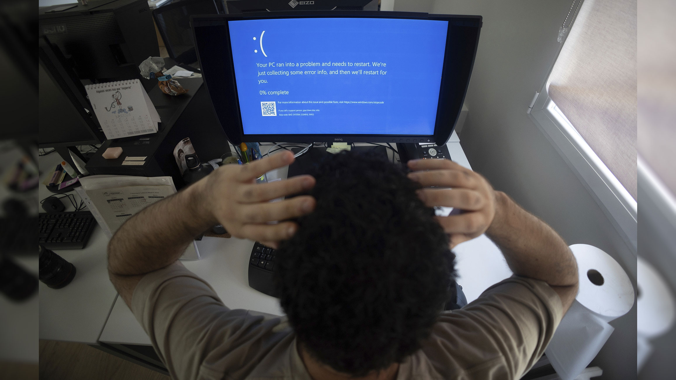 An office worker bemoans a CrowdStrike update problem in Madrid, Spain, July 19, 2024. /CFP