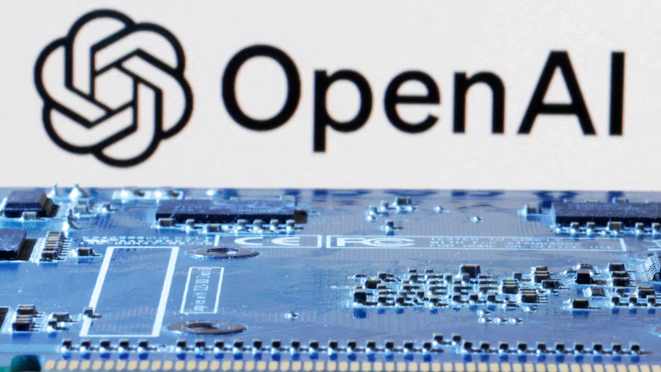 An illustration shows OpenAI logo and computer motherboard, January 8, 2024. /Reuters