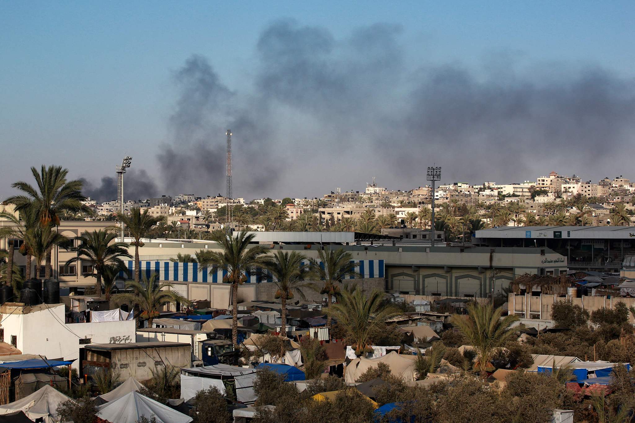Smoke rises from Israeli bombardment in Nuseirat refugee camp in the central Gaza Strip, July 19, 2024. 