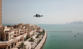 Chinese company Ehang completes a flight demonstration of its manned autonomous flying vehicle in Qatar in 2018. /Ehang