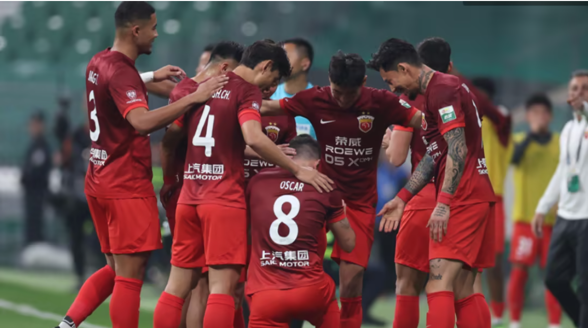 Shanghai Port celebrate after scoring against Qingdao Hainiu in east China's Shanghai Municipality, July 21, 2024. /Xinhua