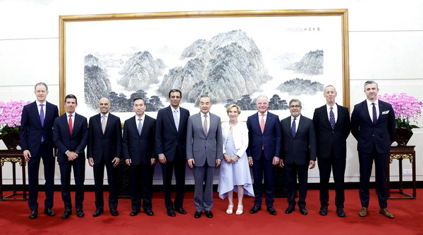 Chinese Foreign Minister Wang Yi (C) meets with a delegation of the board of the U.S.-China Business Council in Beijing, China, July 22, 2024. /Chinese Foreign Ministry