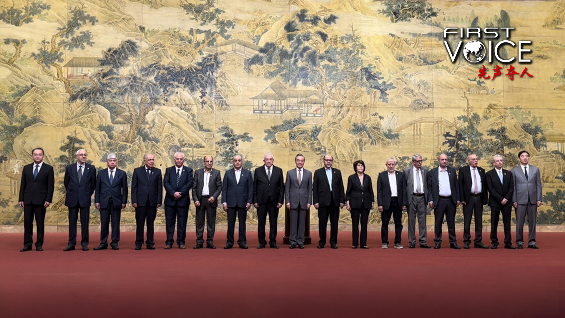 Chinese Foreign Minister Wang Yi (C), also a member of the Political Bureau of the Communist Party of China Central Committee, poses for a group picture with members of the Palestinian factions during the signing of the Beijing Declaration in Beijing, China, July 23, 2024. /Chinese Foreign Ministry