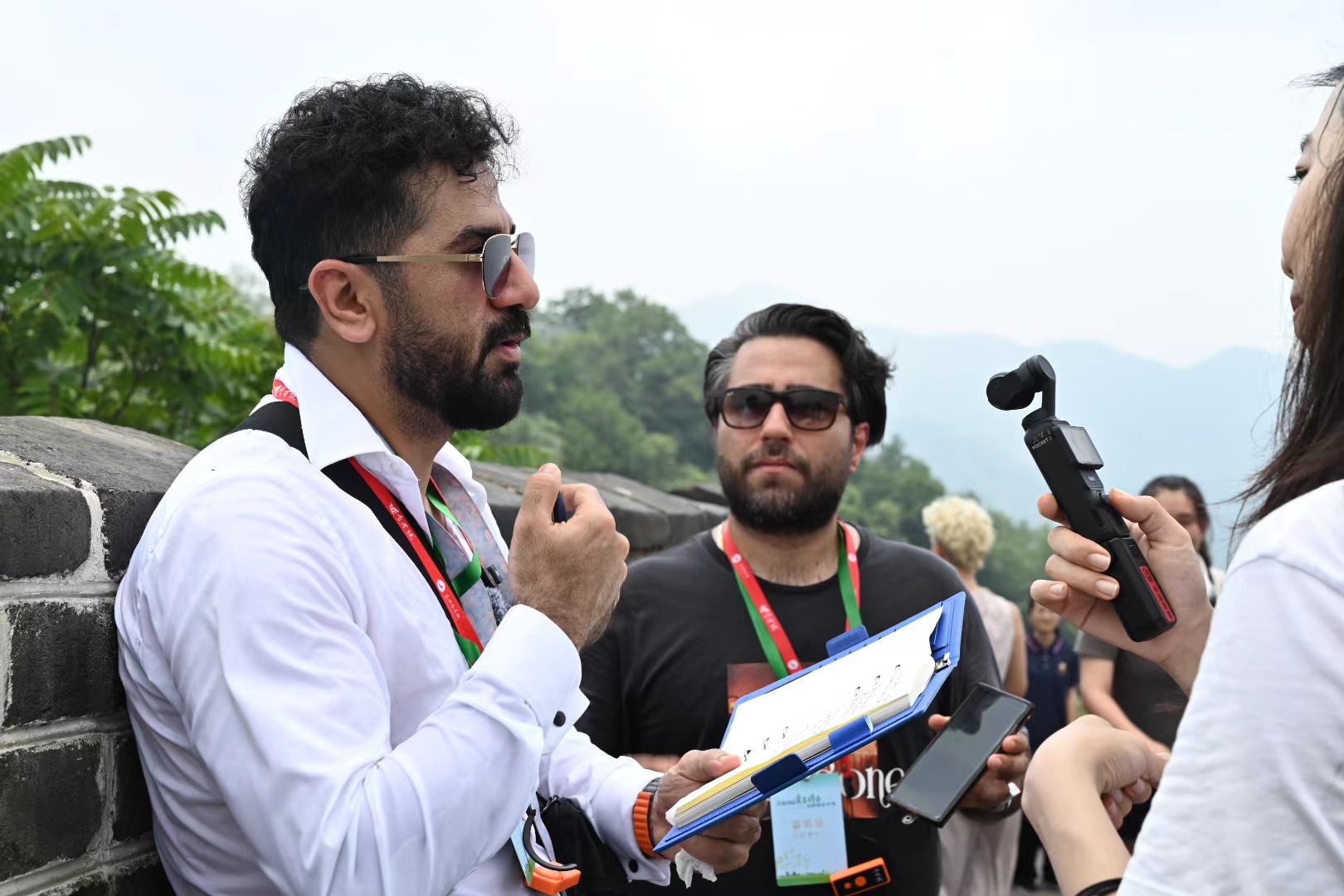 Poets from BRICS countries visit the Mutianyu section of the Great Wall, where they share their original poems, Beijing, China, July 24, 2024. /CGTN